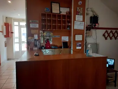 a counter in a store with a counter top at Hotel Korydallos in Piraeus