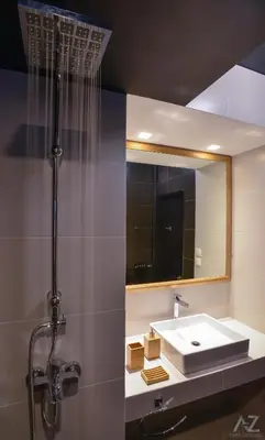 a bathroom with a sink and a mirror at Phaedra Apartment in Athens