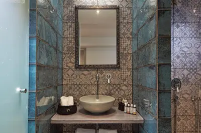 a bathroom with a sink and a mirror at 18 Micon Str. in Athens