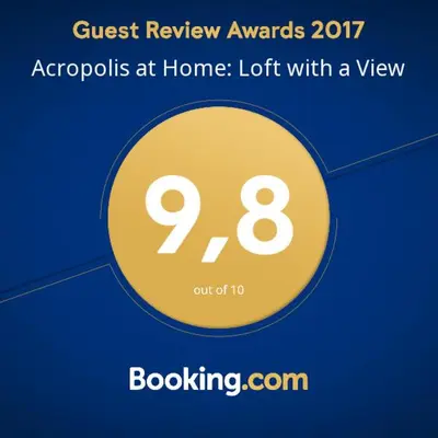 a yellow circle with the words exorcisms at home left with a view at Acropolis at Home: Loft with a View in Athens
