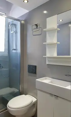 a bathroom with a toilet and a sink and a shower at KYMA Apartments - Athens Acropolis 4 in Athens