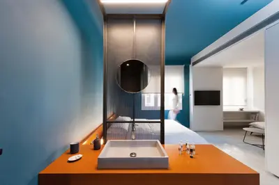 a bathroom with a tub and a sink in a room at Syntagma Square Modern Apartments in Athens