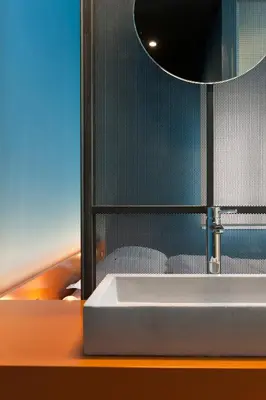 a bathroom with a sink and a mirror at Syntagma Square Modern Apartments in Athens