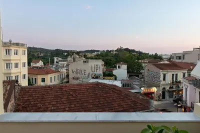 a view of a city from the roof of a building at Acropolis View Luxury Apartment in Athens
