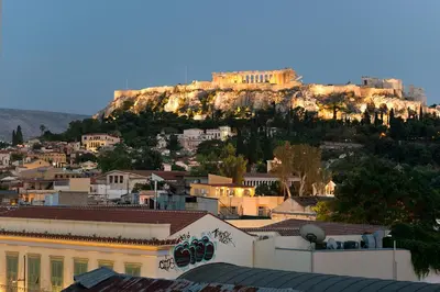 a view of a city with a mountain in the background at Acropolis View Luxury Apartment in Athens