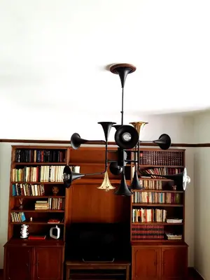 a room with a book shelf filled with books at Kolonaki Deco Apartment in Athens