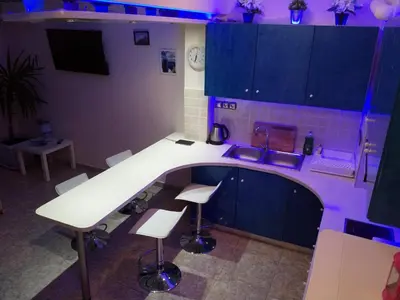 a kitchen with a white counter and a sink at Cosy apartment Acropolis Point-3 in Athens