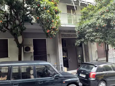 a black van parked in front of a house at Cosy apartment Acropolis Point-3 in Athens