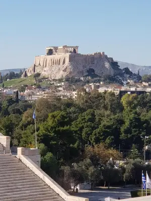 a view of the acropolis of athens from the stairs of theropolis at Apartment at Acropolis Museum by YHA in Athens