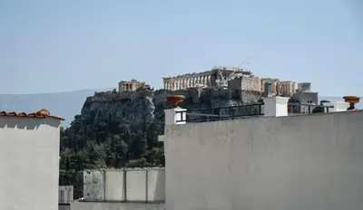 a view of the acropolis of athens from a building at Miranda's Apartment in Thissio in Athens