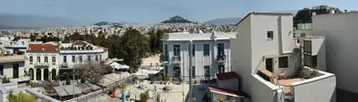 an aerial view of a city with buildings at Miranda's Apartment in Thissio in Athens
