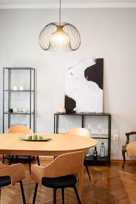 a dining room with a table and chairs at Apartment Vresthenis in Athens