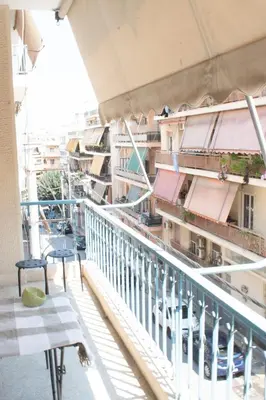 a balcony with a view of buildings at Apartment Vresthenis in Athens