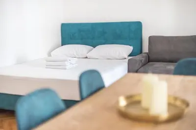 a small room with a bed and a couch at Victoria Sun Apartments in Athens