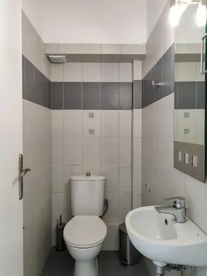 a bathroom with a toilet and a sink at KYMA Apartments - Athens Acropolis 13 in Athens