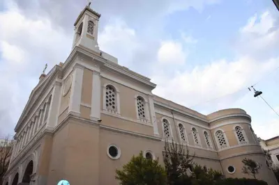 a large church with a tower on top of it at Ulysses Apartments Monastiraki in Athens