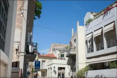 a view of a city street with buildings at Back to Tradition, by the Acropolis! in Athens
