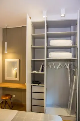 a walk in closet with a bunk bed at Skoufa Apartment in Athens