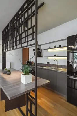 a kitchen with a wooden table and a sink at Elliniko Luxury Residence by First Class Properties in Athens