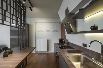 a kitchen with a sink and a counter at Elliniko Luxury Residence by First Class Properties in Athens