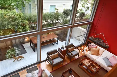 an overhead view of a living room with a large window at Villa Amaryllis in Athens