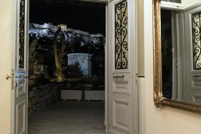 an open door to a room with a mirror at Aerides 3 Luxury Suites in Athens