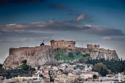 a castle perched on top of a mountain at Athens Residence Apartments in Athens