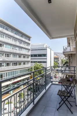 a balcony with a view of a building at The Athens Insider in Athens