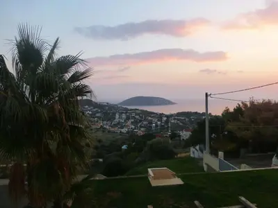 a view from the roof of a house at sunset at Seaview near Athens & Sounio in Anavissos