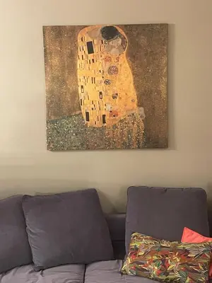 a painting on the wall above a couch at Athens-Plaka, Peter's House in Athens