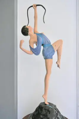 a figurine of a woman dancing with a hoop at Plaka Elegant Apartment in Athens