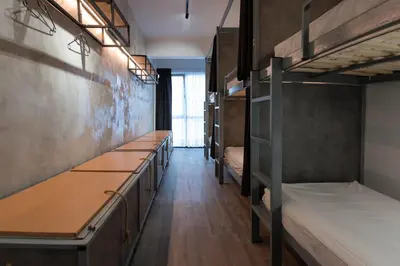 a row of bunk beds in a dorm room at Bedbox Hostel in Athens