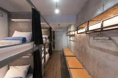 a group of bunk beds in a room at Bedbox Hostel in Athens