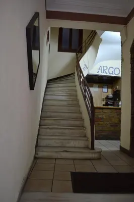 a stairway leading up to a building at Argo Hotel in Athens
