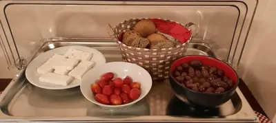 a group of different foods in a refrigerator at Olympic Fashion Hotels in Athens
