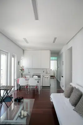 a living room with a couch and a table at Mind-blowing Acropolis View Apt in Athens