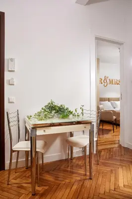 a dining room with a table and chairs at Luxury apartment central in Athens