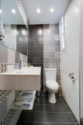 a bathroom with a toilet and a sink at Athens Comfort in Athens
