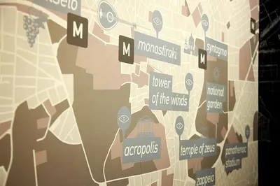 a poster of a woman with a map of the city at Athens Centre Apartment in Athens