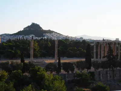 a view of the acropolis of athens from the city at Alexander's Penthouse in Athens