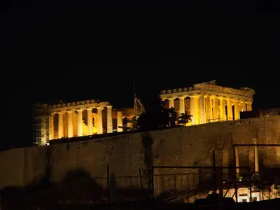 a building with lights on top of it at night at Alexander's Penthouse in Athens