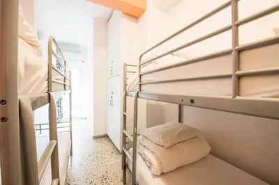 a room with two bunk beds with a pillow at Safestay Athens Monastiraki in Athens