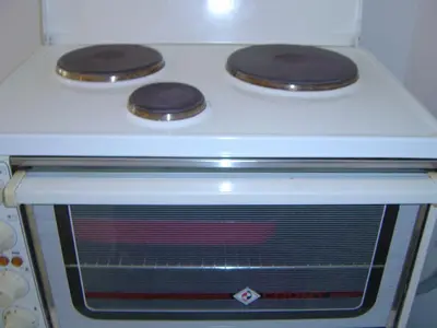 a white stove with two burners on top of it at Medea in Athens