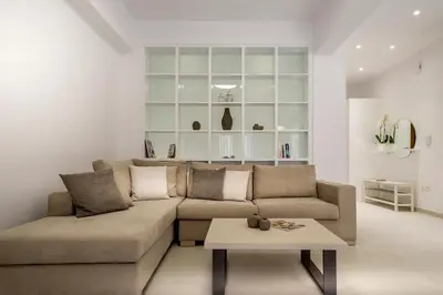 a living room with a couch and a coffee table at Acropolis Museum - Modern Living [I] in Athens