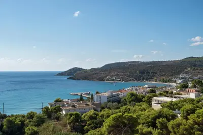 a view of a town and the ocean at Hotel Afea in Agia Marina Aegina