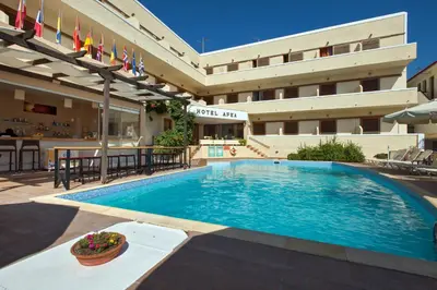 a large swimming pool in front of a building at Hotel Afea in Agia Marina Aegina