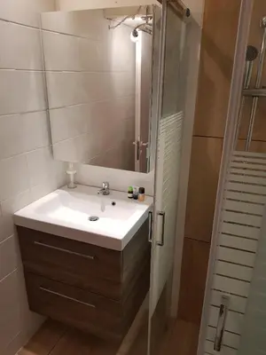 a bathroom with a sink and a shower at Sounio Palea Heaven in Palaiá Fókaia