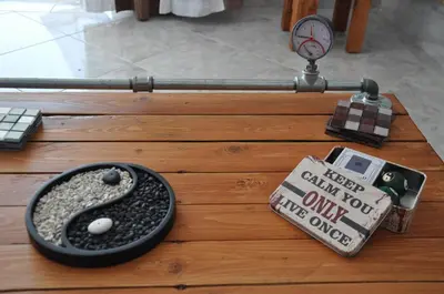 a table topped with a dog bowl and a scale at Your Home in Athens