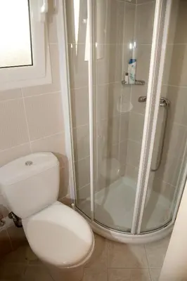a bathroom with a toilet and a shower at Elegant Studio in Kolonaki-Top Location! in Athens