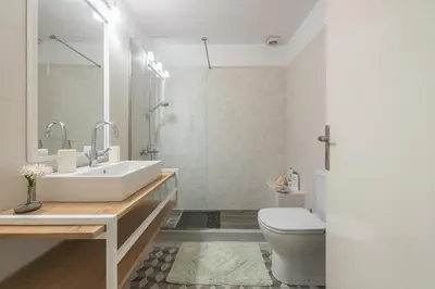 a bathroom with a sink and a toilet at Athenian House in Plaka Villa by Athenian Homes in Athens